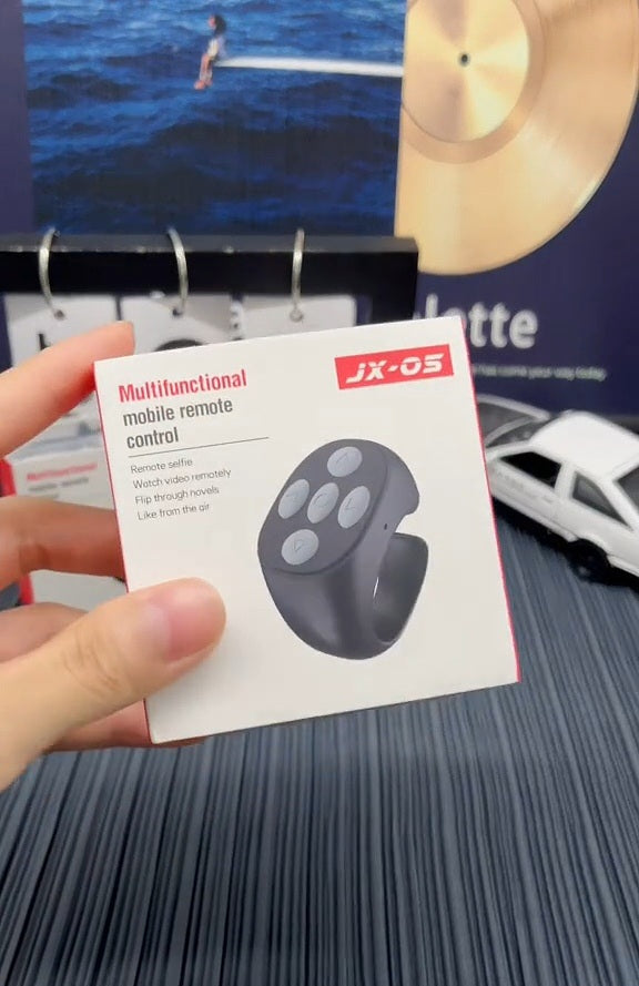JX-05 -Button Bluetooth Remote Control Smart Ring for Mobile Phones. JX-05 - حلقة ذكية مزودة بزر للتحكم عن بعد بتقنية البلوتوث للهواتف المحمولة